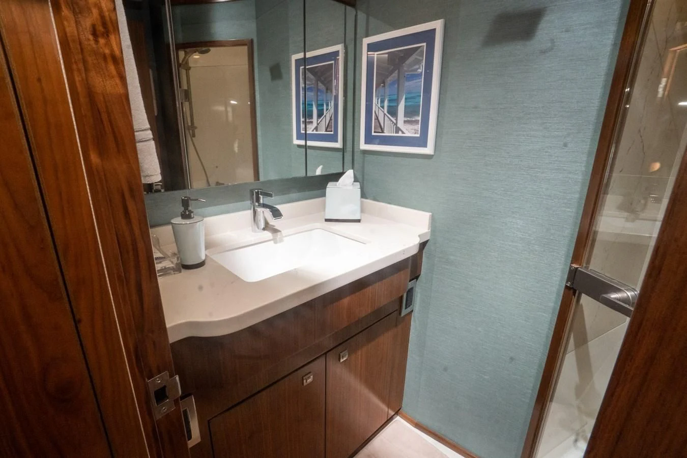 a bathroom with a sink and a mirror aboard KALEEN Yacht for Sale