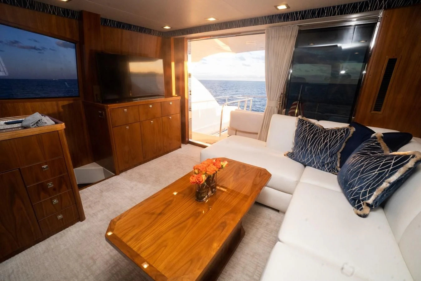 a living room with a large window aboard KALEEN Yacht for Sale
