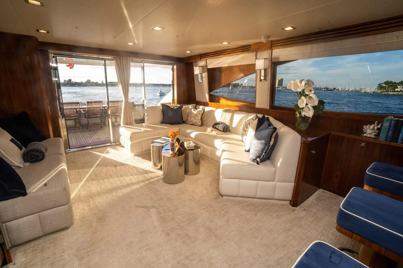 a living room with a large window aboard KALEEN Yacht for Sale