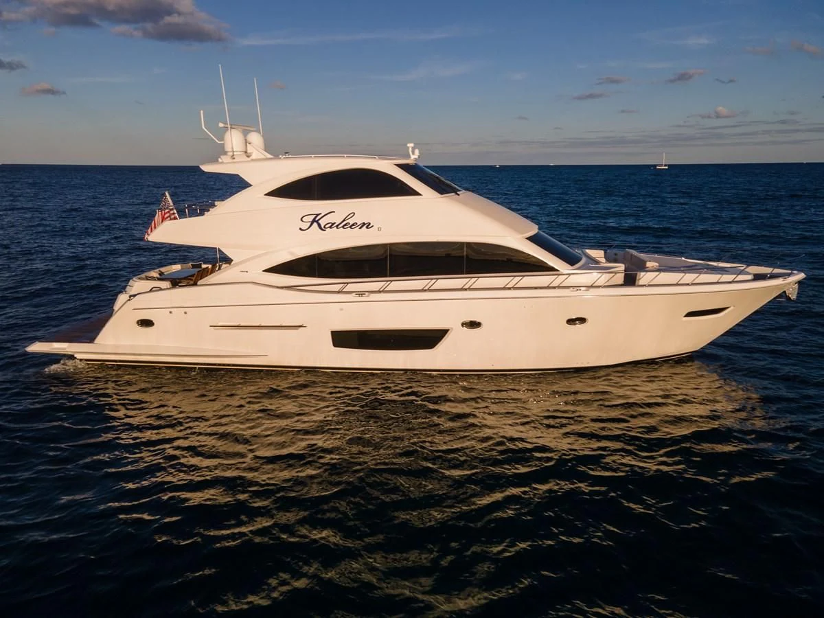 a white yacht on the water aboard KALEEN Yacht for Sale