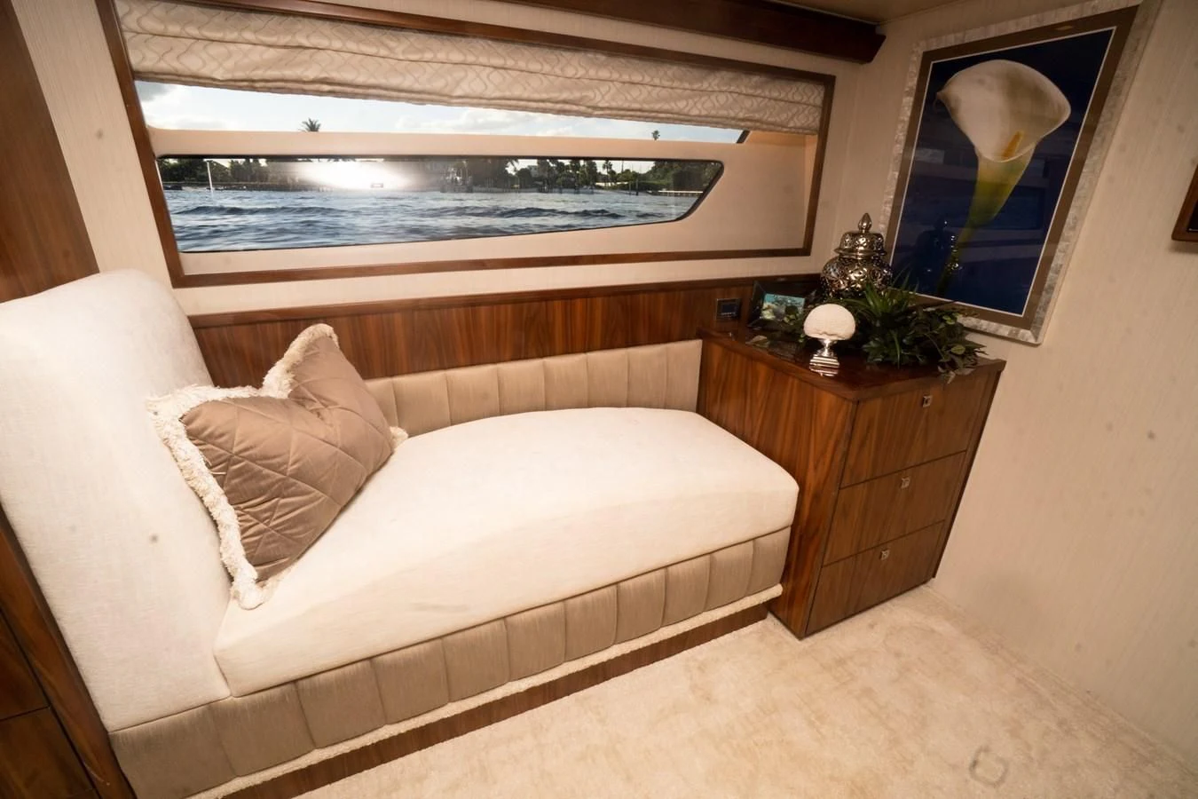 a bed with a white pillow aboard KALEEN Yacht for Sale