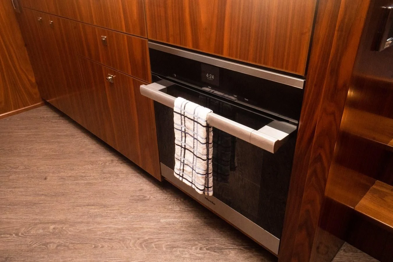 a kitchen with a stove and oven aboard KALEEN Yacht for Sale