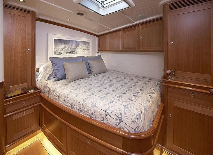 a bed in a room aboard KEALOHA Yacht for Sale
