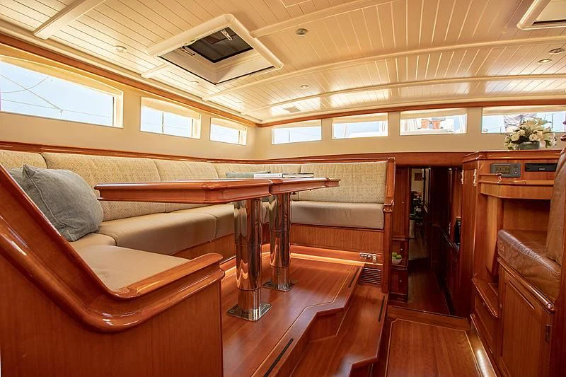 a room with a couch and a table aboard KEALOHA Yacht for Sale