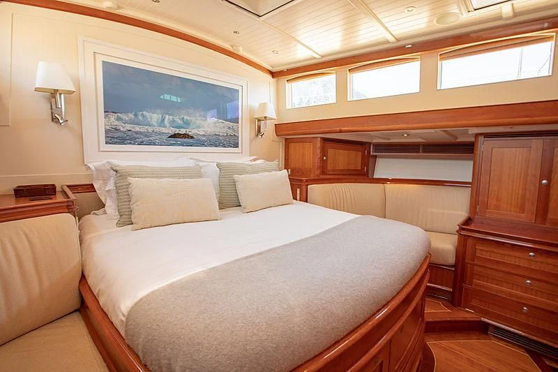 a bed in a room aboard KEALOHA Yacht for Sale