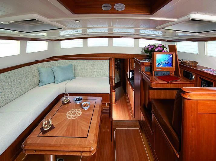 a room with a couch and a table aboard KEALOHA Yacht for Sale