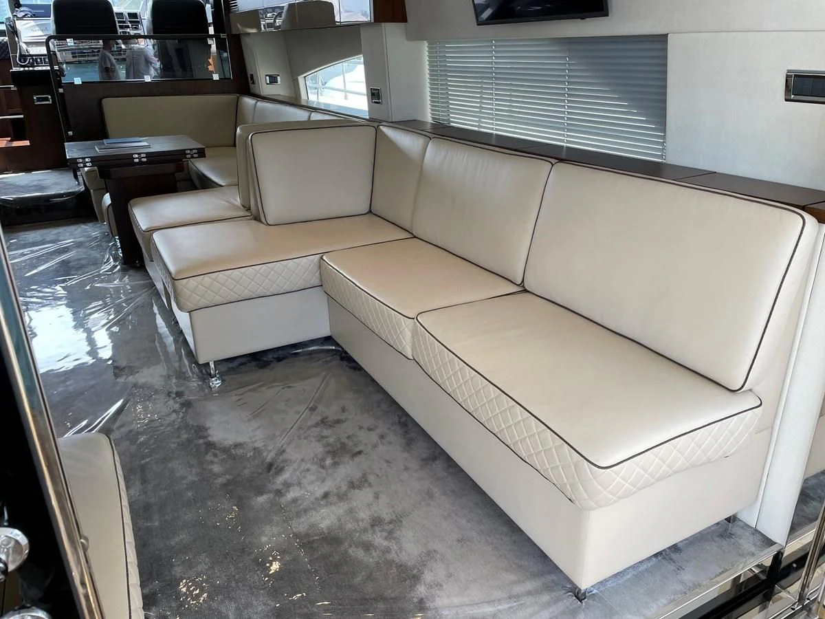 a couch in a room aboard FAIRLINE SQUADRON 65 Yacht for Sale