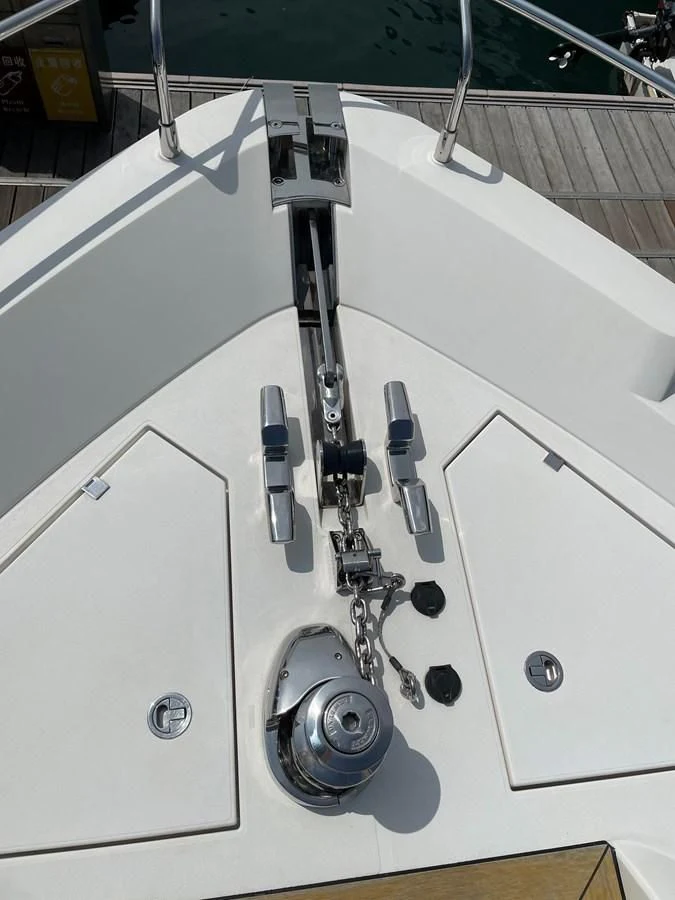 a white machine with a metal handle aboard FAIRLINE SQUADRON 65 Yacht for Sale