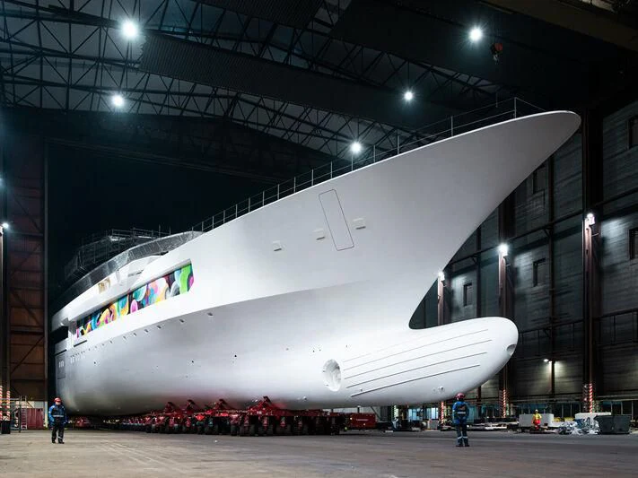 a large white airplane in a hangar aboard DREAMBOAT Yacht for Sale