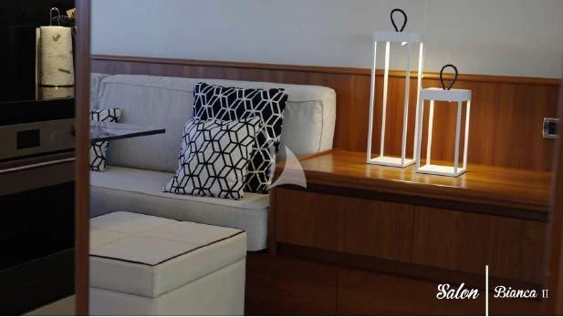 a room with a couch and a table aboard BIANCA II Yacht for Charter