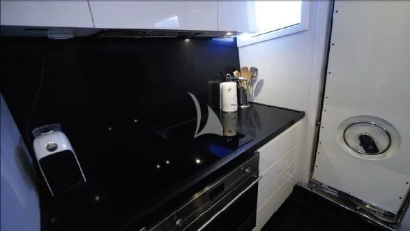 a washing machine in a room aboard BIANCA II Yacht for Charter