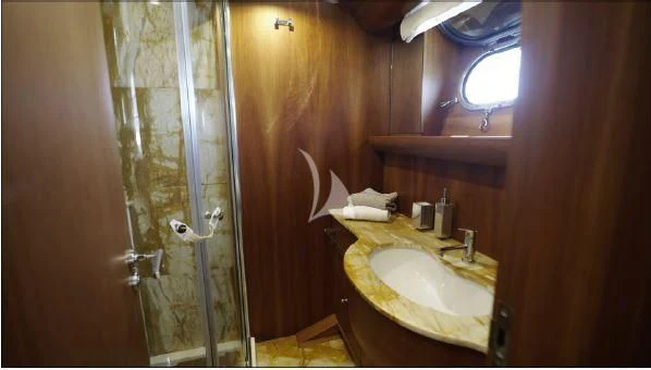 a bathroom with a shower and sink aboard BIANCA II Yacht for Charter