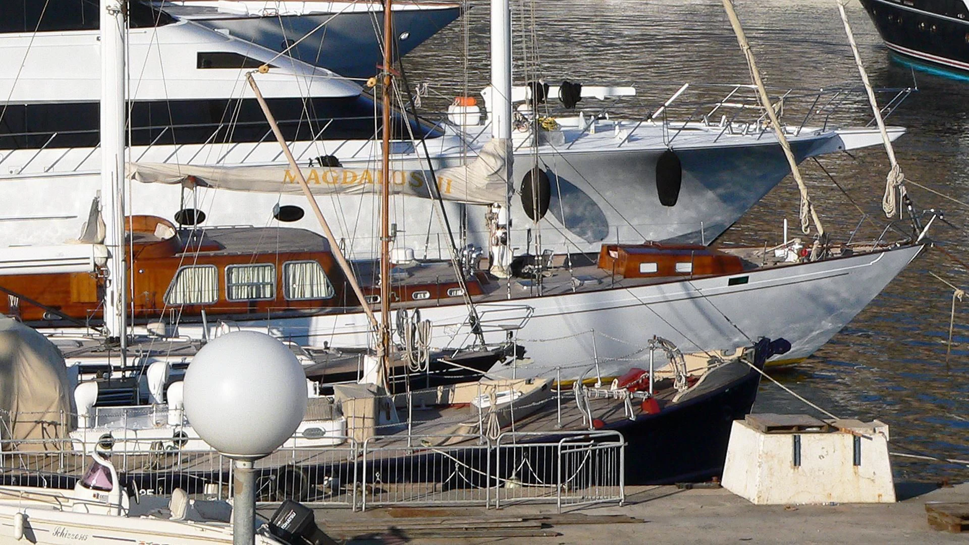 a boat docked at a pier aboard MAGDALUS SECONDO Yacht for Sale