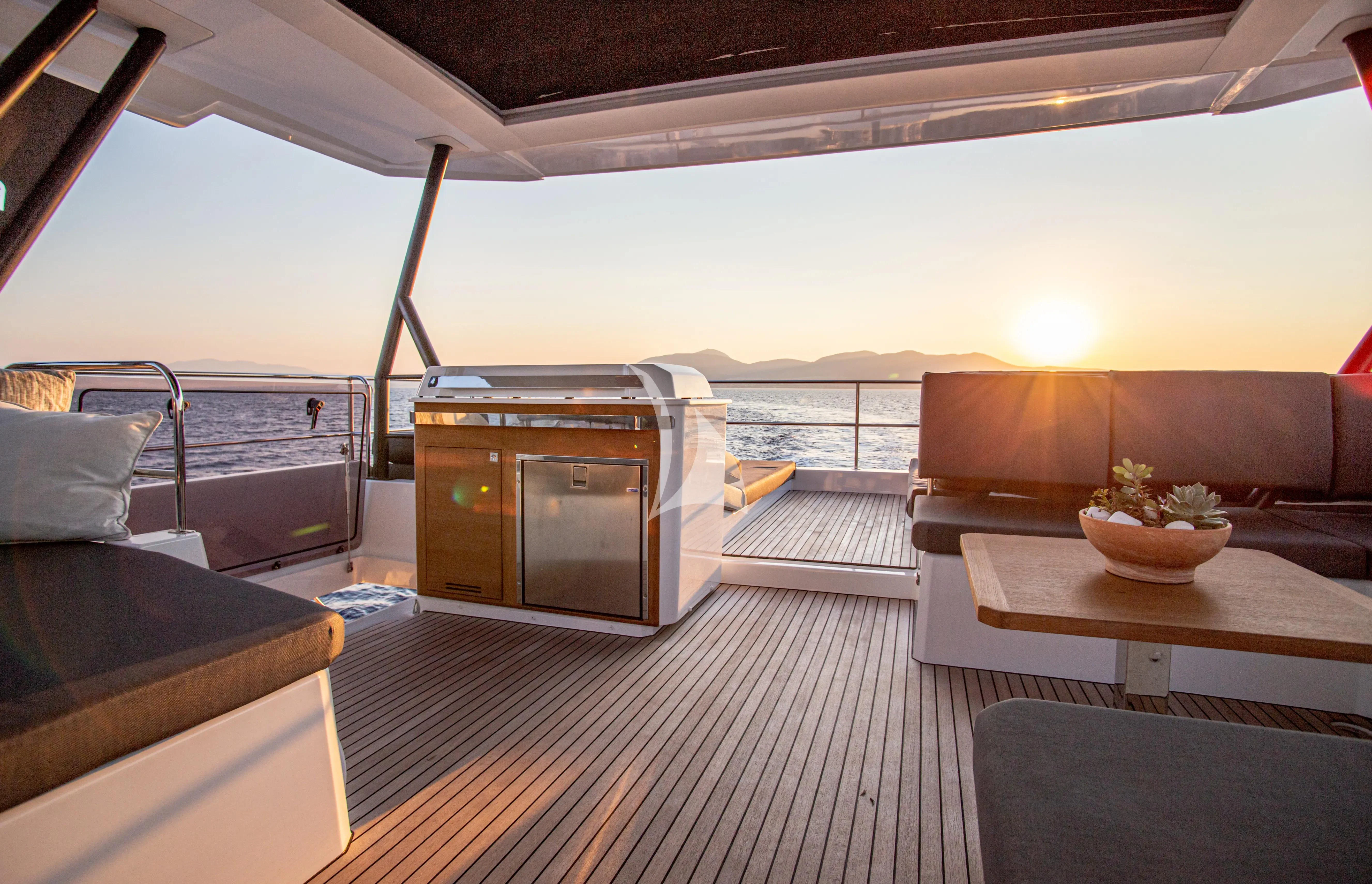 a boat with a wood deck aboard MAJESTY OF GREECE Yacht for Charter