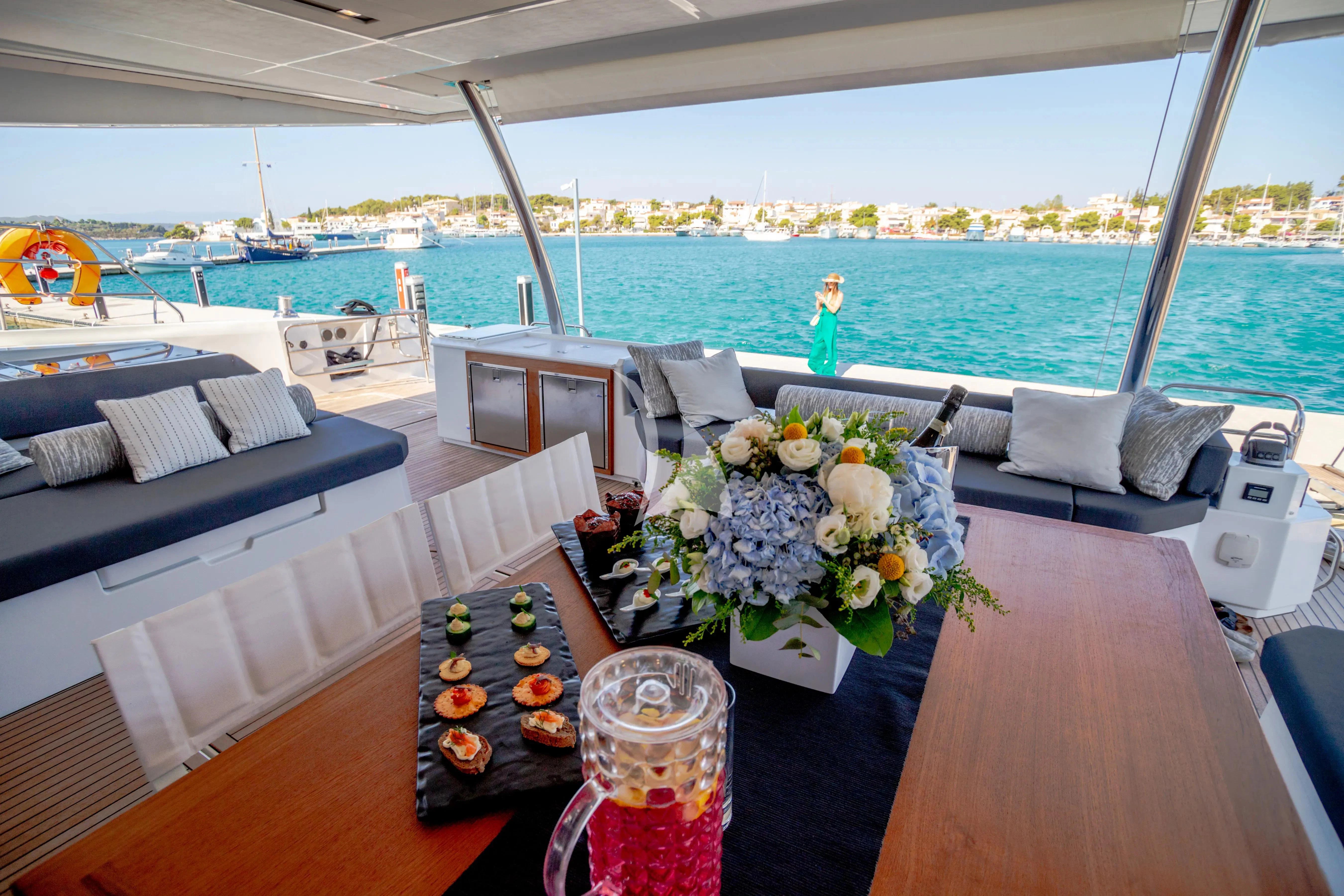 a table with food on it aboard MAJESTY OF GREECE Yacht for Charter