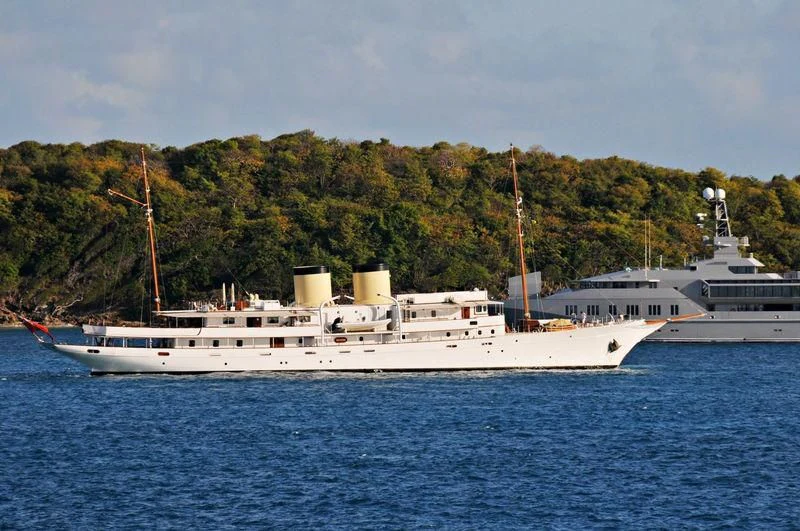 a large white boat in the water aboard TALITHA Yacht for Sale
