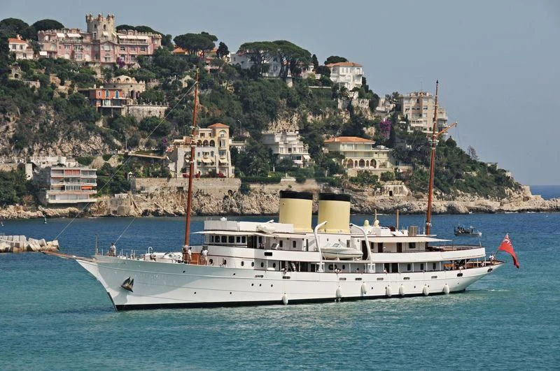 a large white boat in the water aboard TALITHA Yacht for Sale