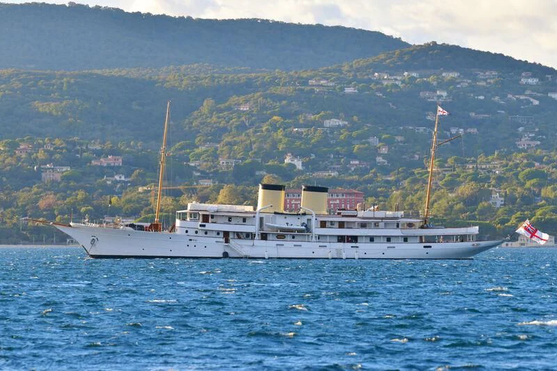 a large ship in the water aboard TALITHA Yacht for Sale