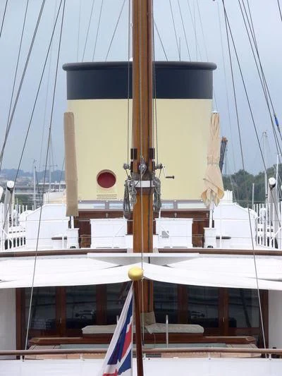 a large sailboat in a harbor aboard TALITHA Yacht for Sale