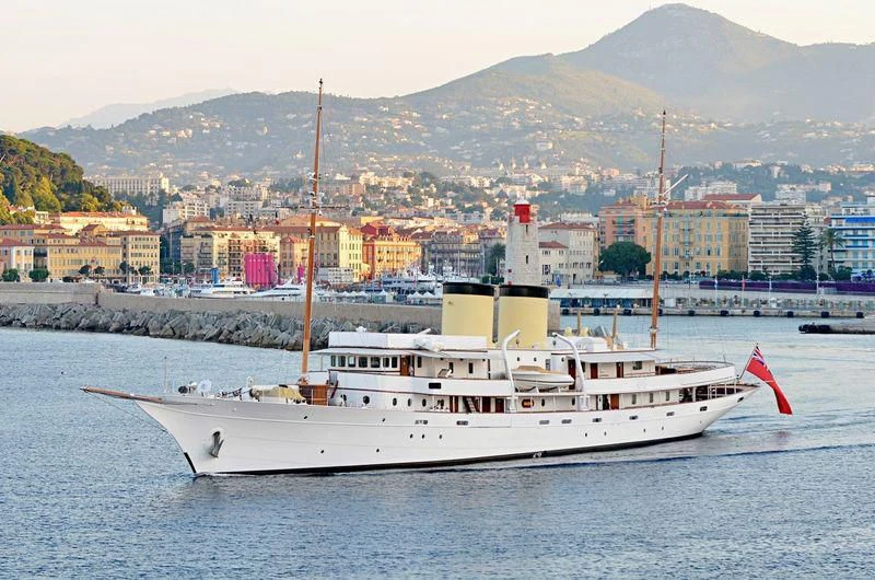 a large ship in the water aboard TALITHA Yacht for Sale