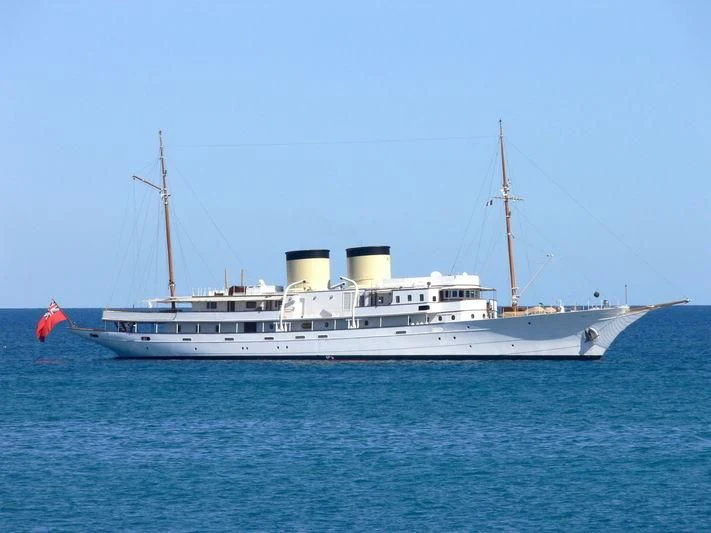 a large white boat in the water aboard TALITHA Yacht for Sale
