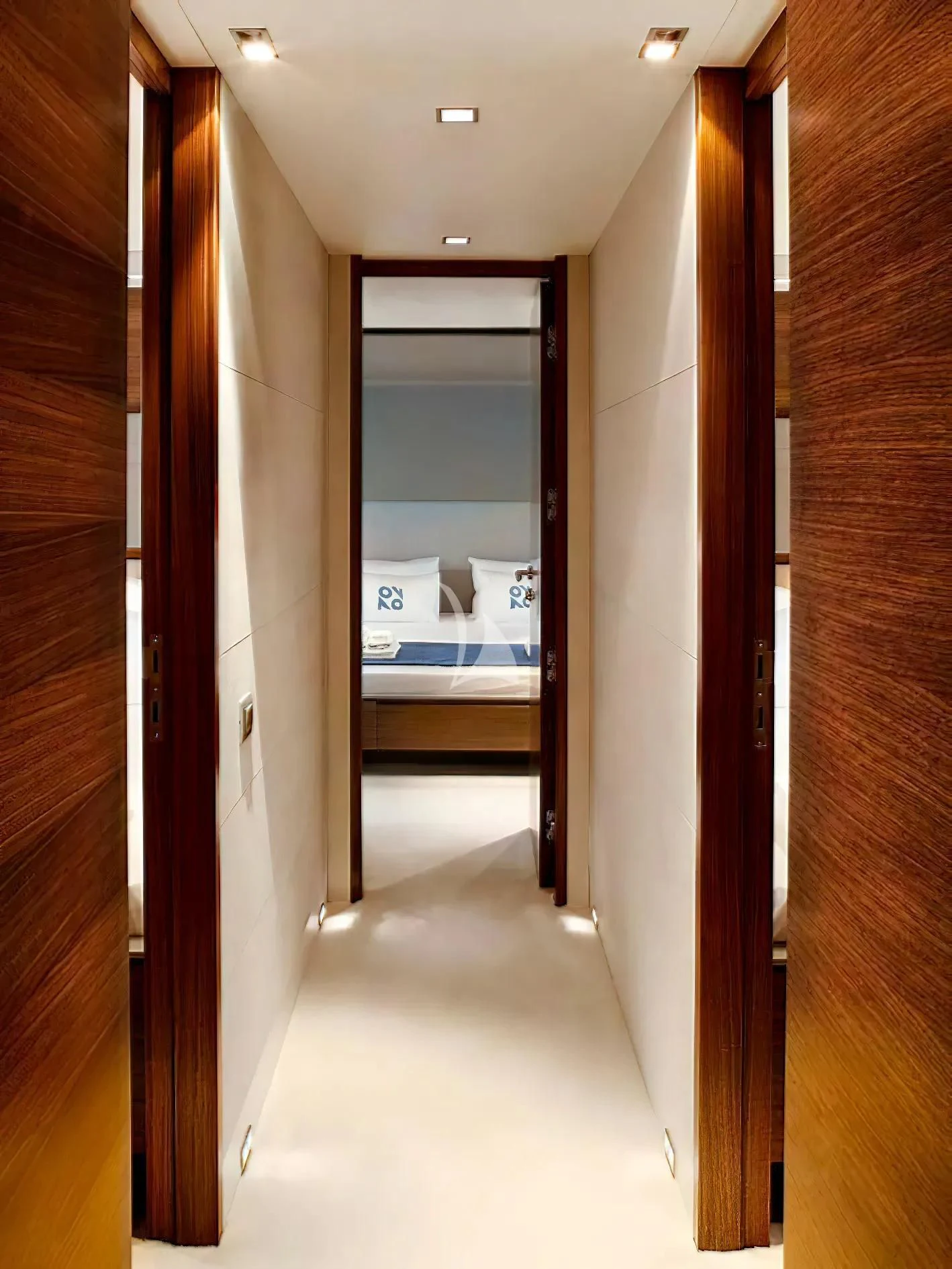 a hallway with a door aboard QUASAR Yacht for Sale