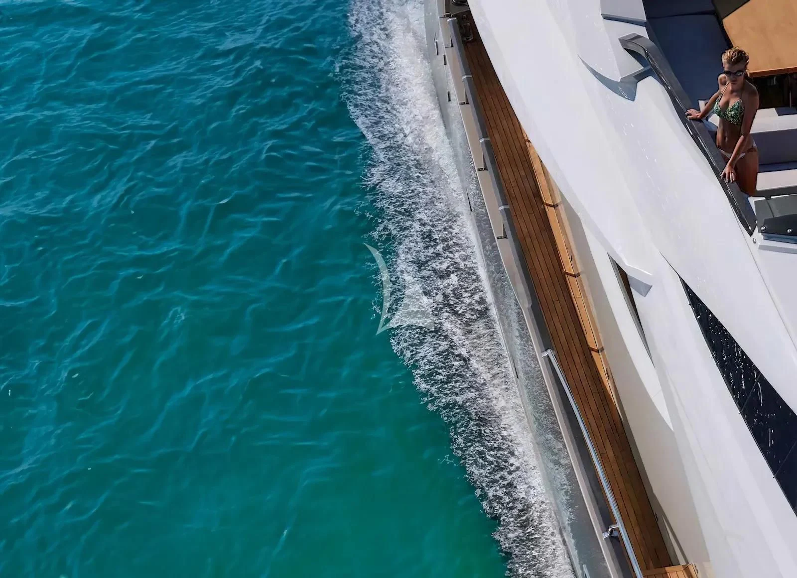 a person standing on a boat aboard QUASAR Yacht for Sale