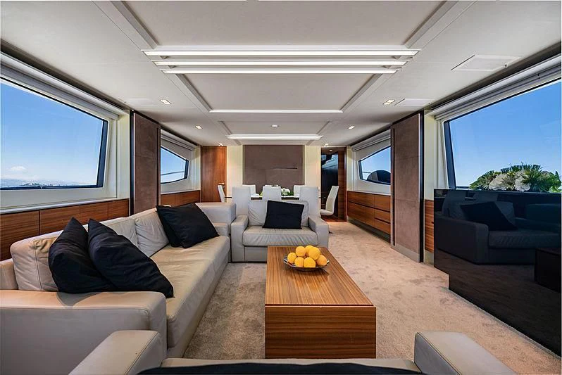 a living room with a large window aboard QUASAR Yacht for Sale