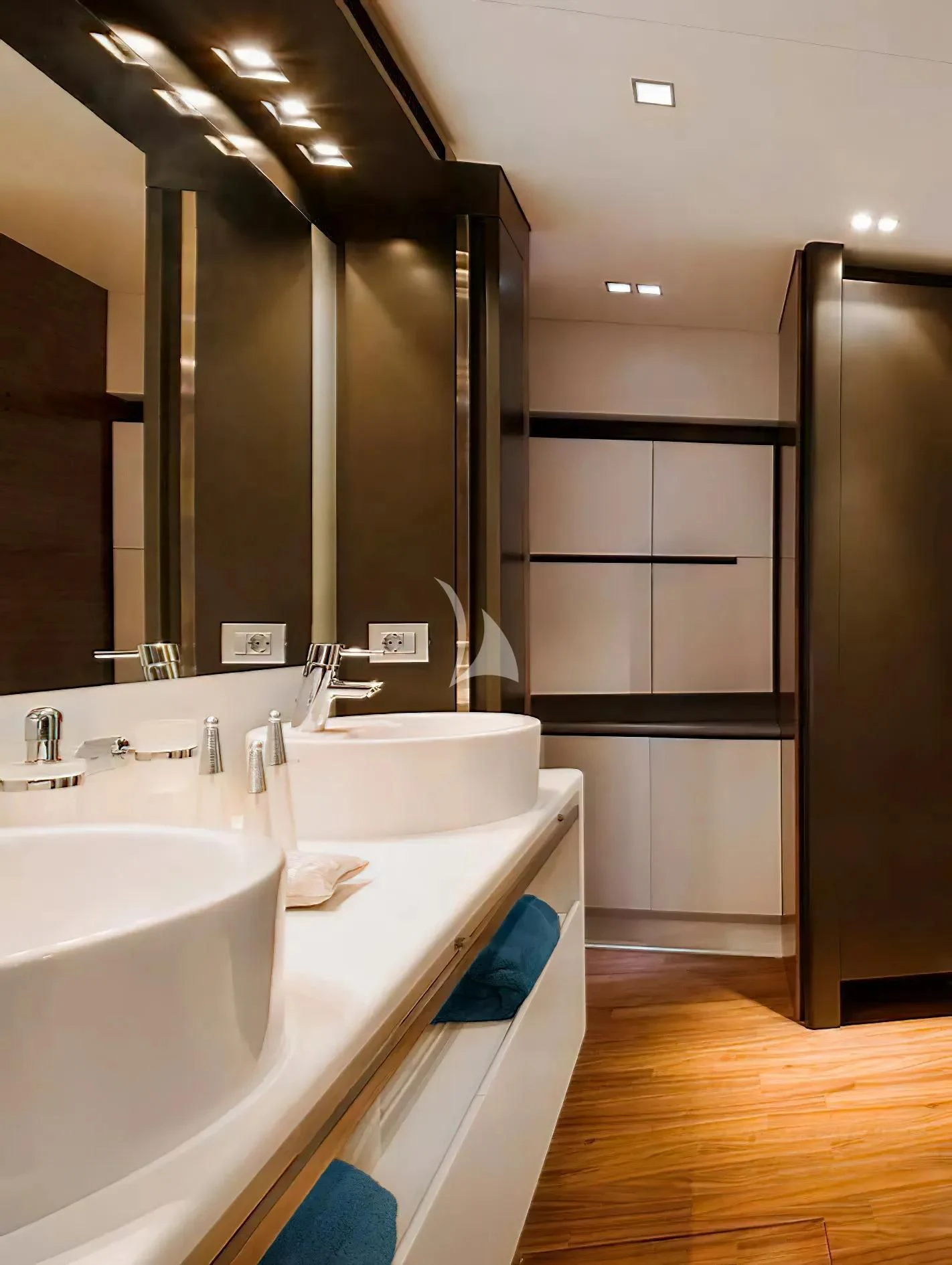 a bathroom with a large mirror aboard QUASAR Yacht for Sale