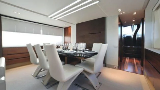 a conference room with chairs and a table aboard QUASAR Yacht for Sale