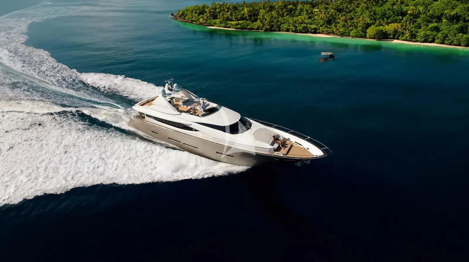 a white yacht on the water aboard QUASAR Yacht for Sale