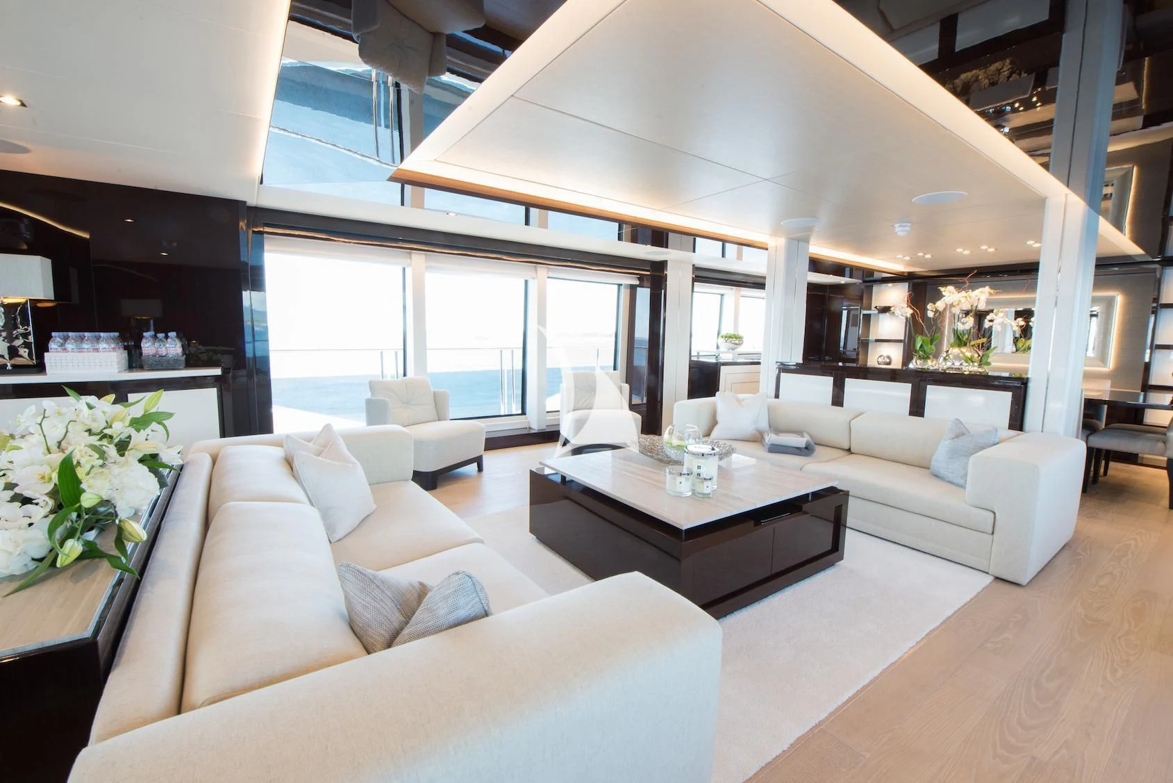 a living room with a large window aboard E-MOTION Yacht for Sale