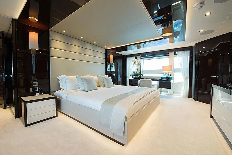 a large bedroom with a large bed aboard E-MOTION Yacht for Sale
