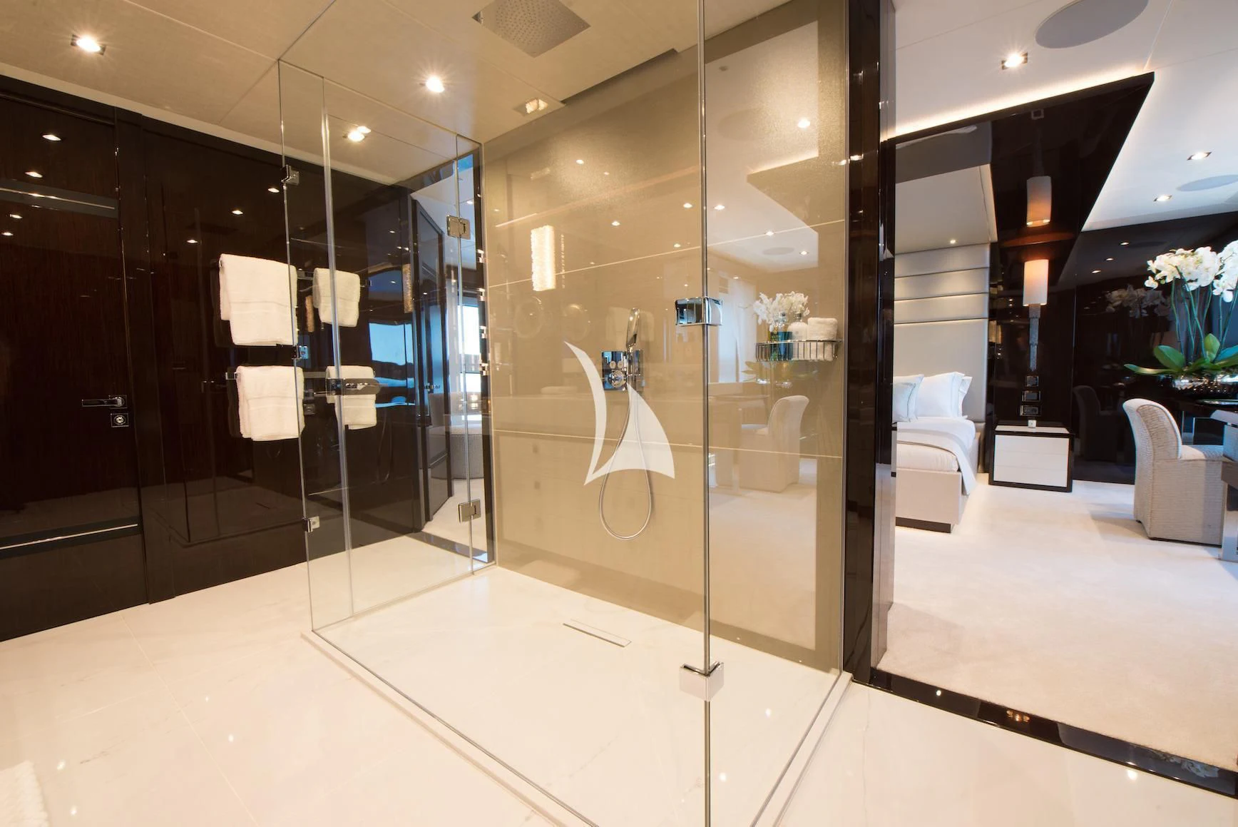 a bathroom with a glass shower aboard E-MOTION Yacht for Sale
