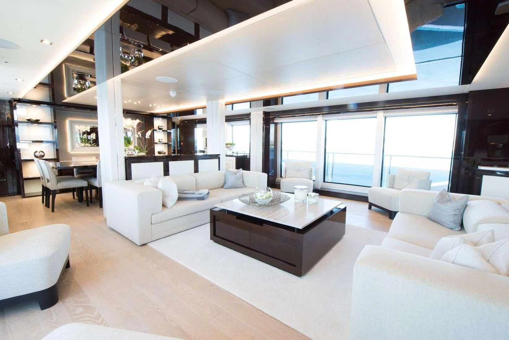 a living room with a large window aboard E-MOTION Yacht for Sale