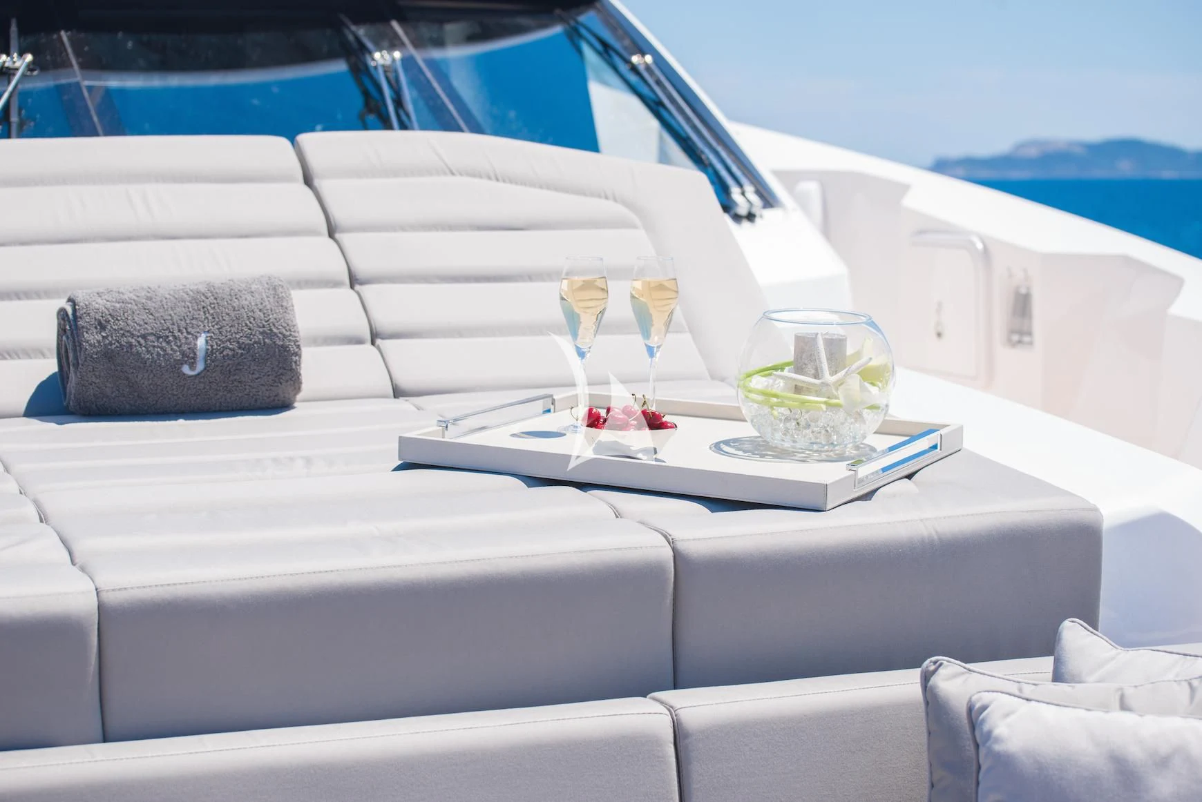 a white boat with drinks on it aboard E-MOTION Yacht for Sale