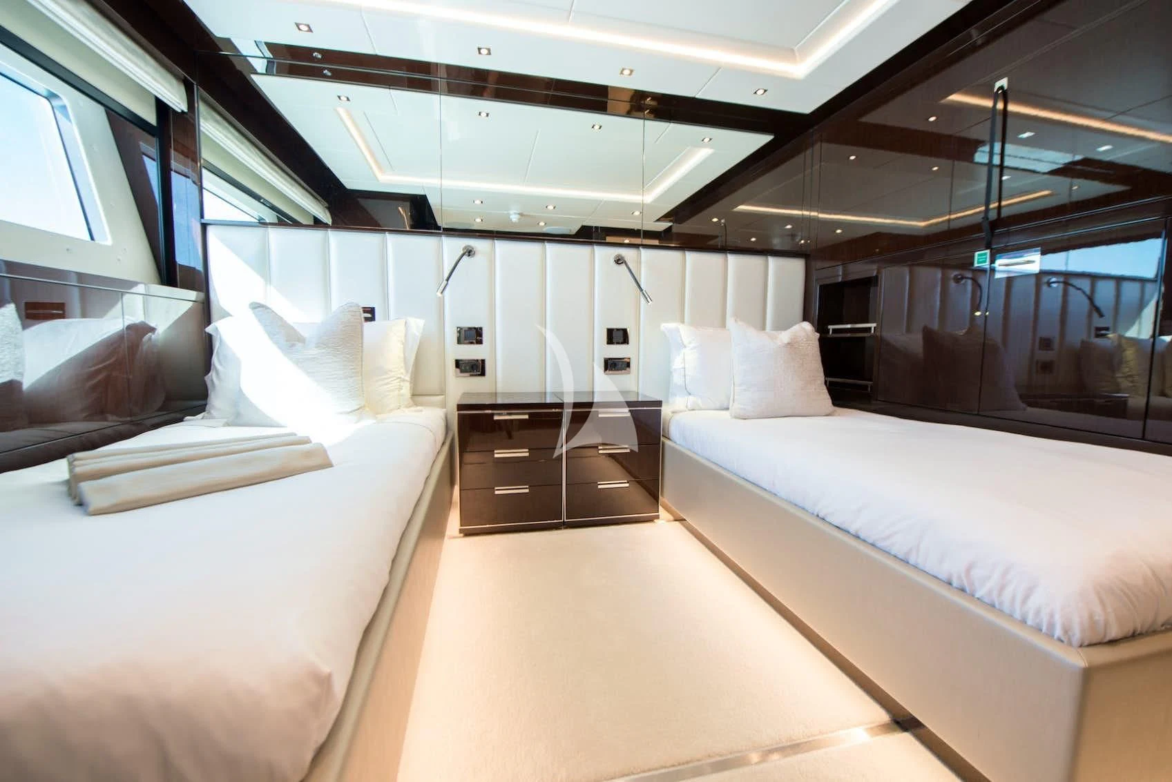 a room with a bed and a couch aboard E-MOTION Yacht for Sale