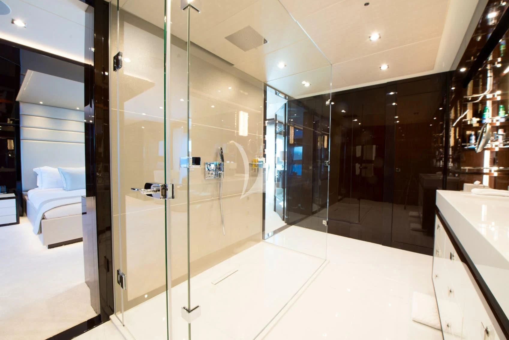a bathroom with glass doors aboard E-MOTION Yacht for Sale