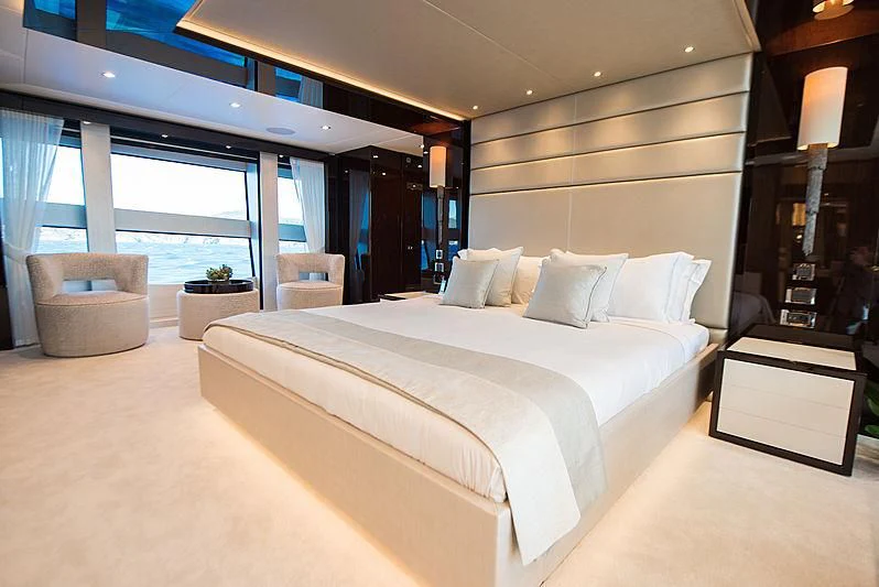 a large bed in a room aboard E-MOTION Yacht for Sale