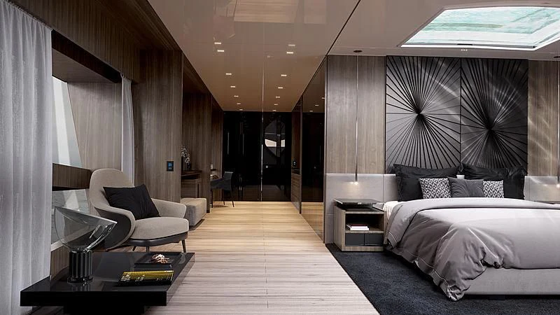 a room with a bed and a chair aboard PEPPERMINT Yacht for Sale
