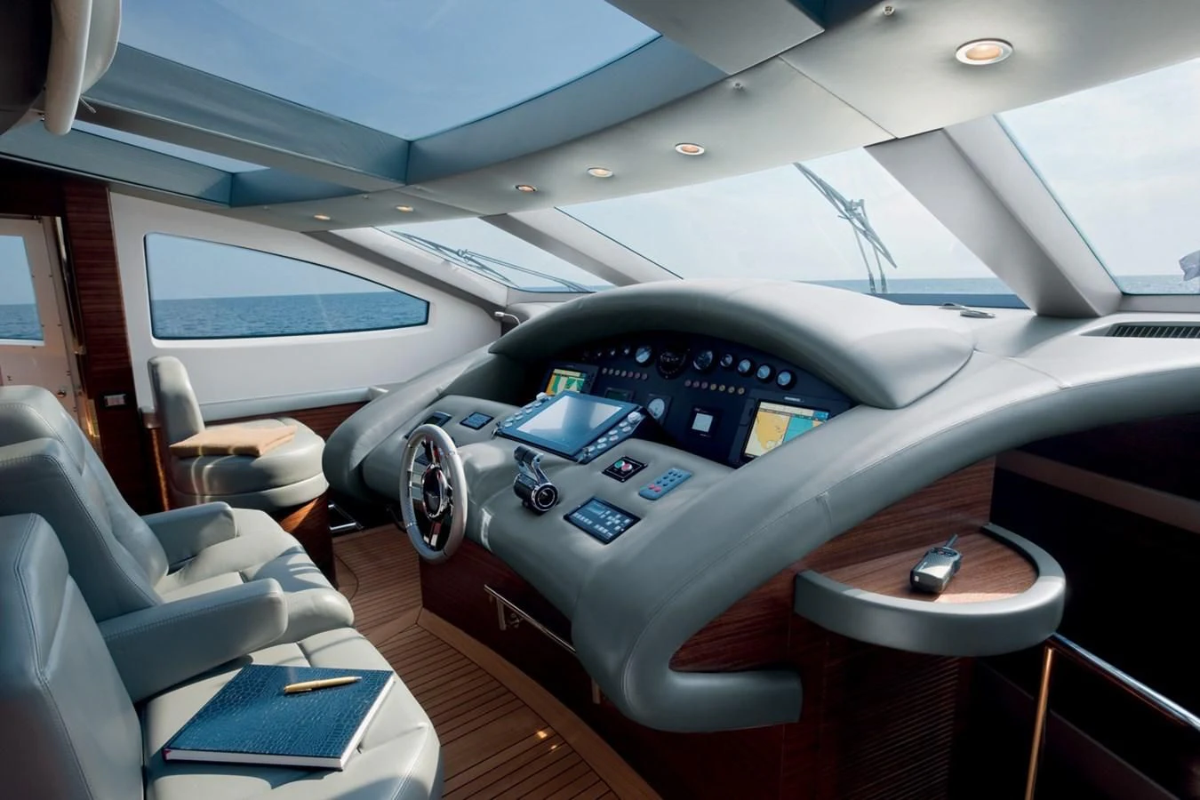 the inside of a car aboard LEONARDO 98 Yacht for Sale