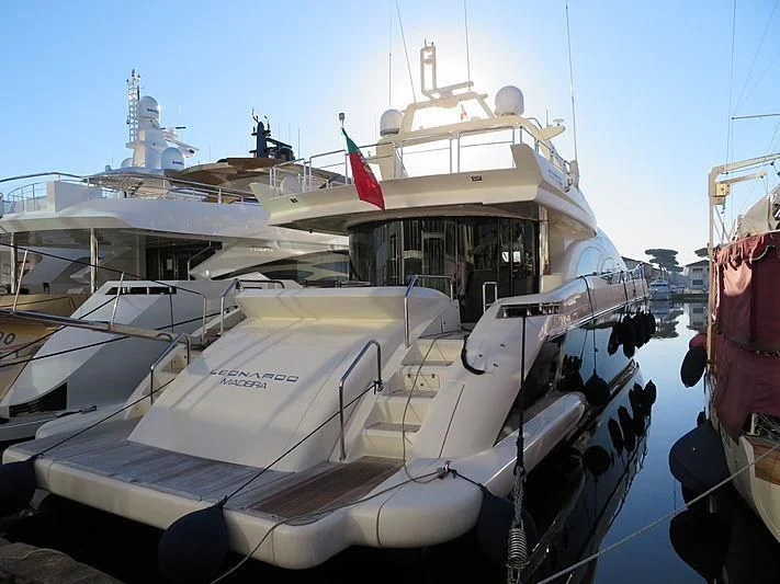 a boat docked at a pier aboard LEONARDO 98 Yacht for Sale