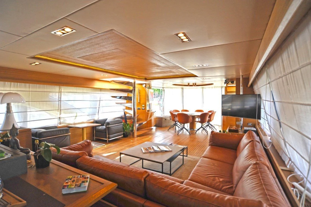 a living room with a large window aboard LEONARDO 98 Yacht for Sale