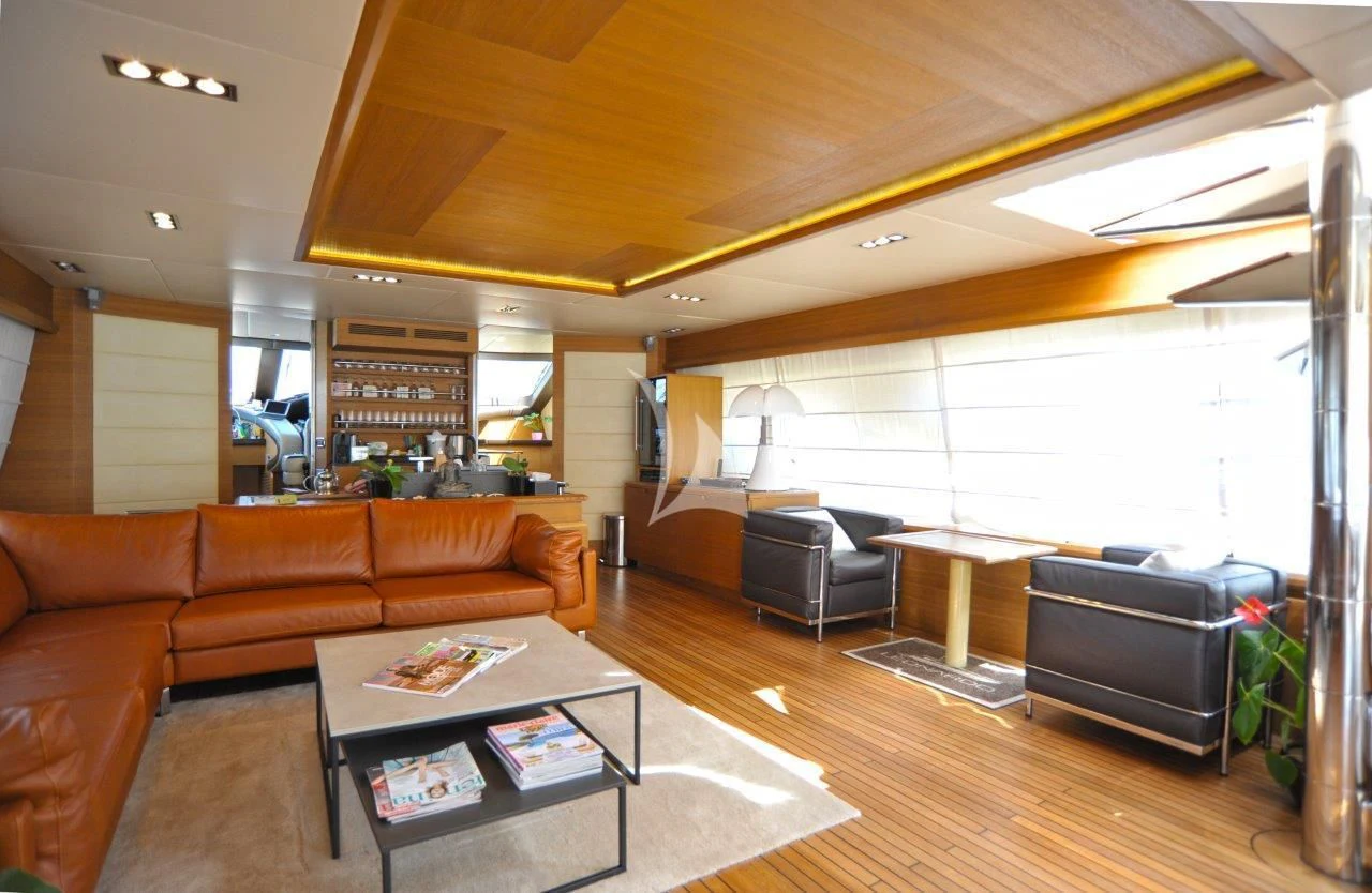 a living room with a large window aboard LEONARDO 98 Yacht for Sale