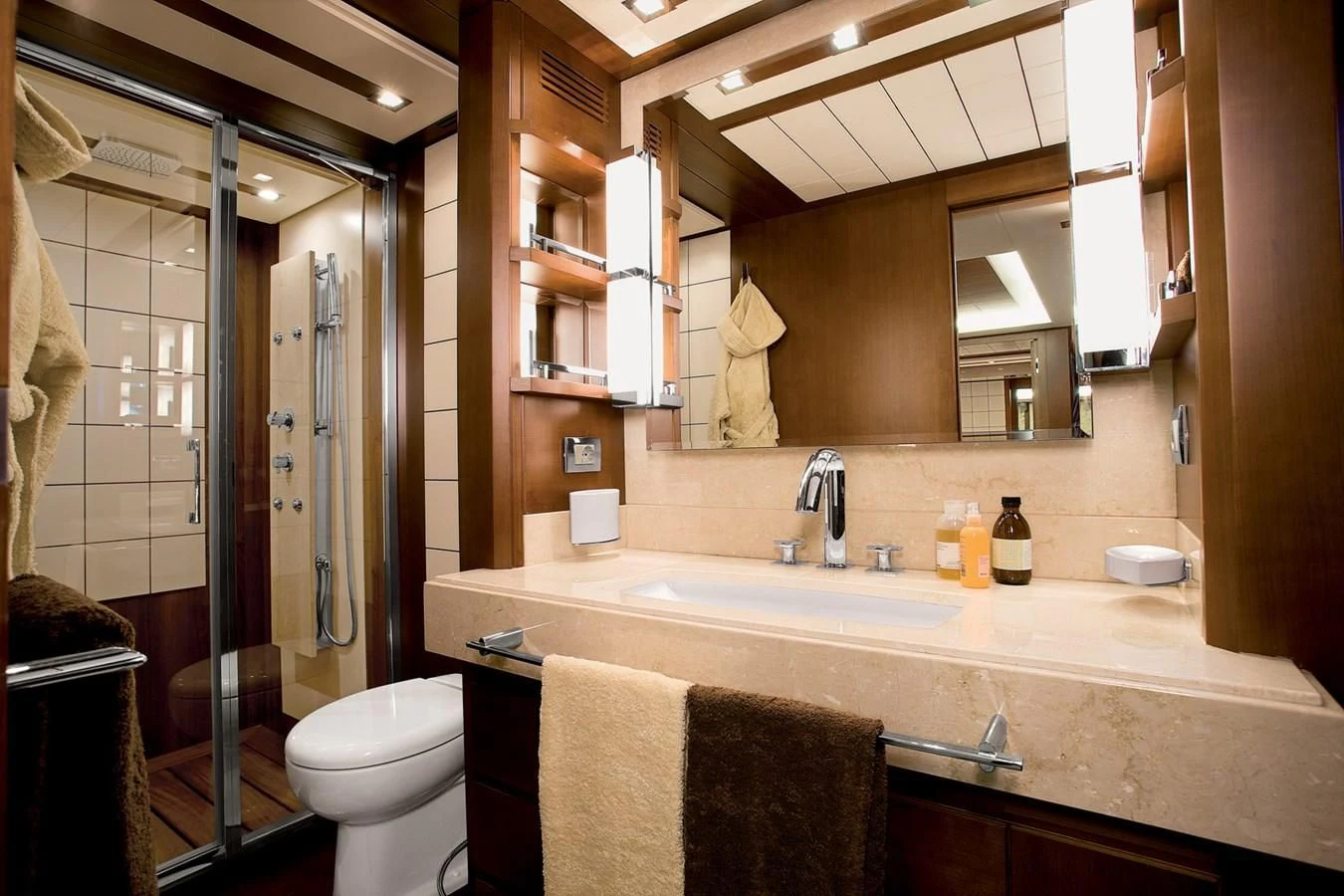 a bathroom with a large mirror aboard LEONARDO 98 Yacht for Sale