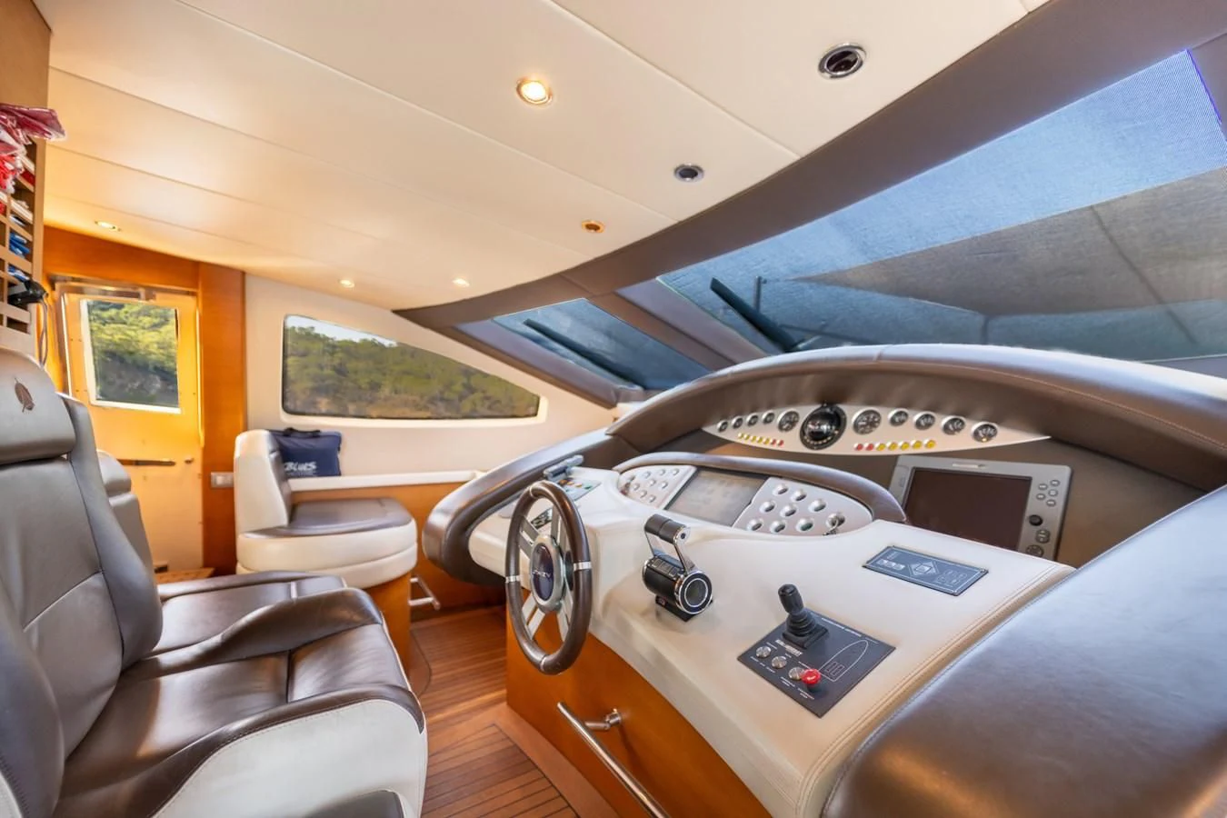 inside of a car aboard LEONARDO 98 Yacht for Sale