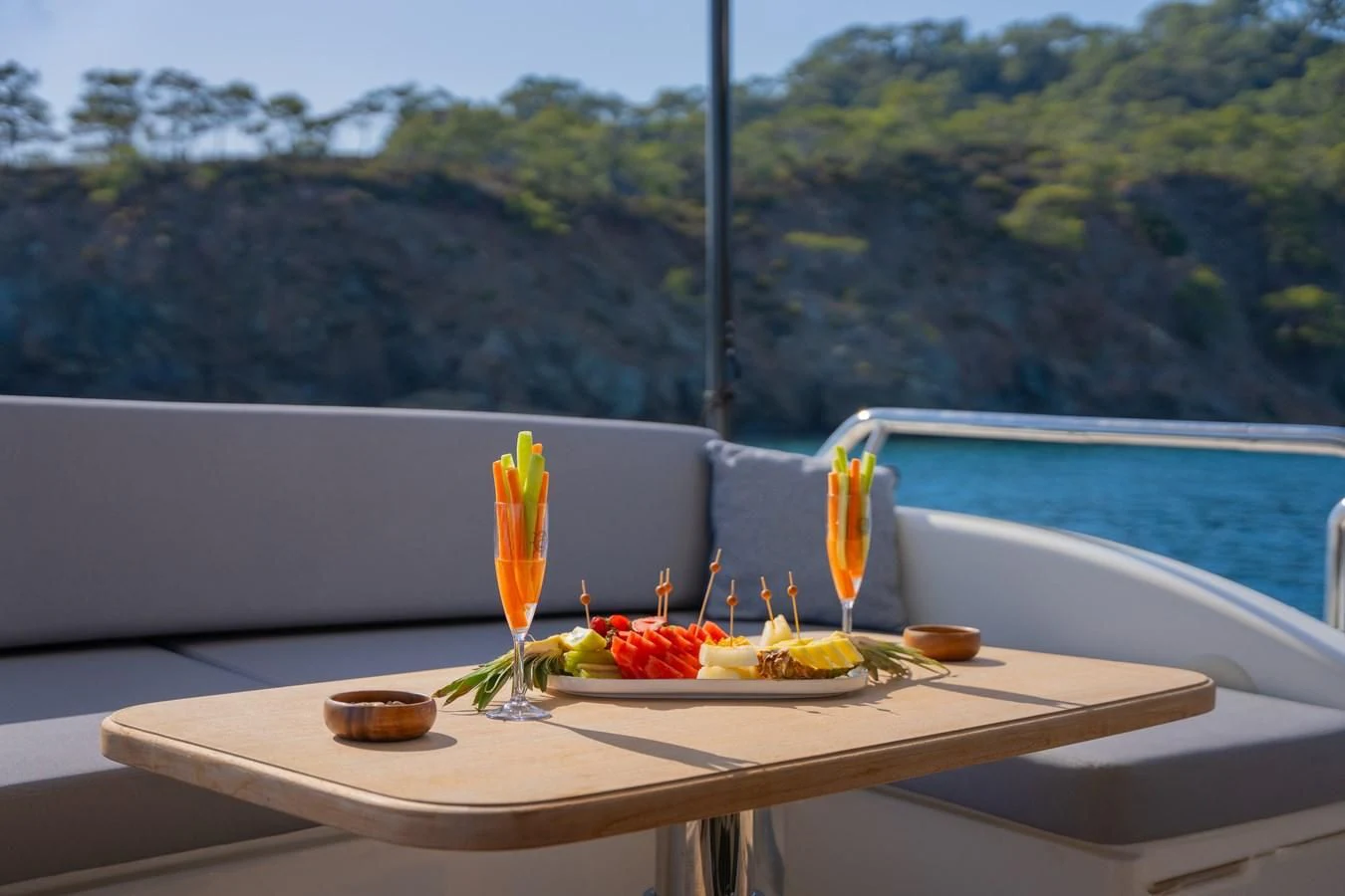 a table with food on it aboard LEONARDO 98 Yacht for Sale