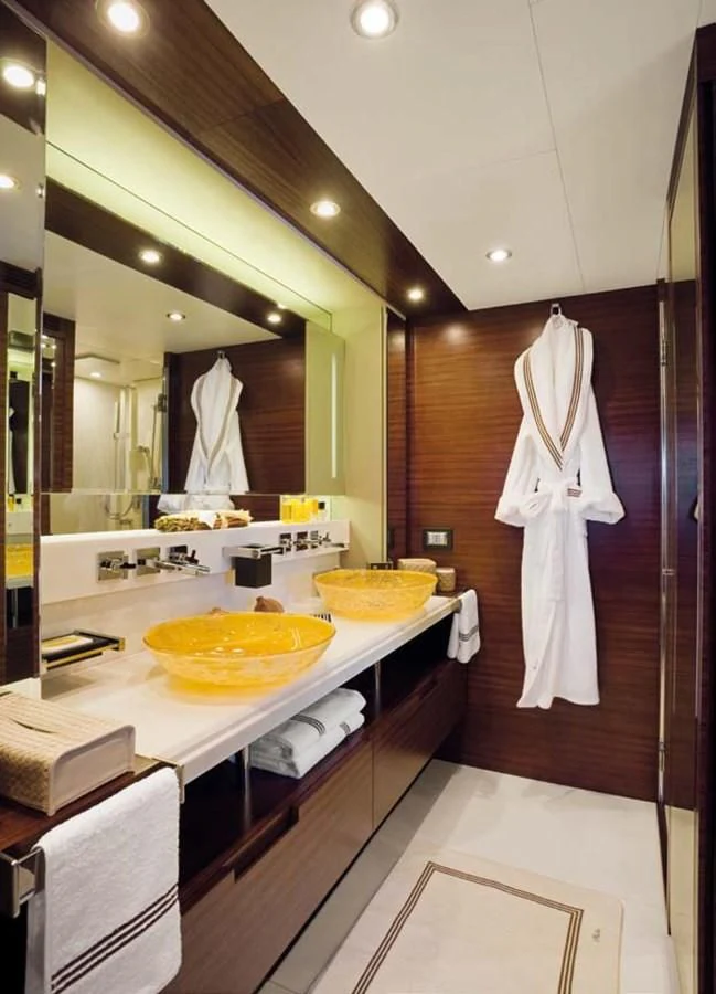 a kitchen with a large mirror aboard LEONARDO 98 Yacht for Sale