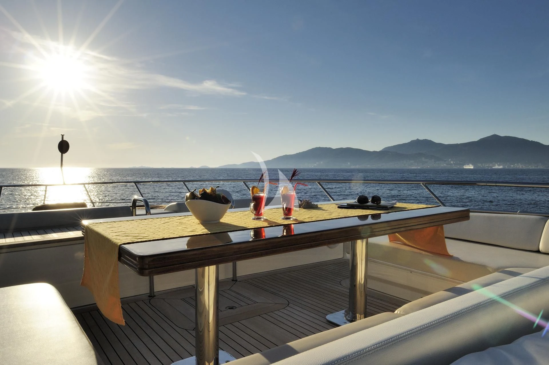 a table on a boat aboard LEONARDO 98 Yacht for Sale