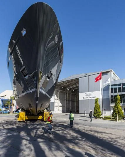 a large black object with a red stripe on it aboard LA PASSION Yacht for Sale